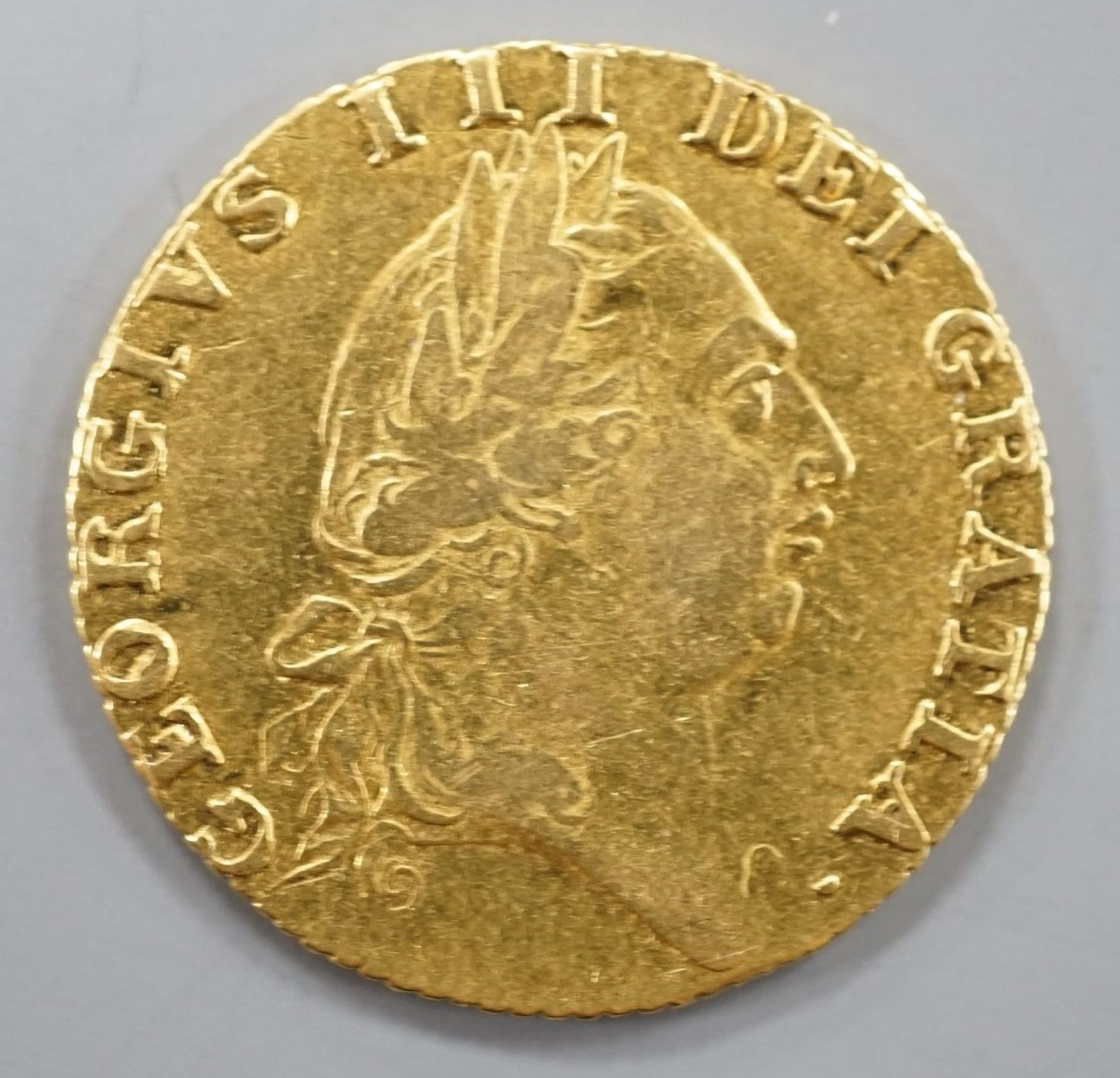 A 1787 gold spade guinea, Good F or better.
